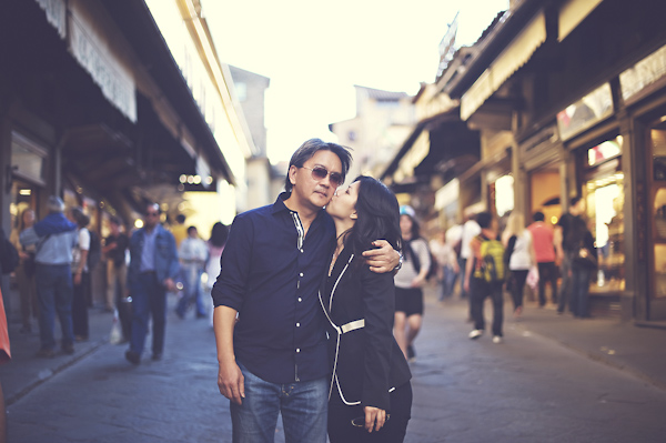 urban engagement photo -  affectionate couple - wedding photo by top Rome based destination wedding photographer Rochelle Cheever, Rome Weddings Photography